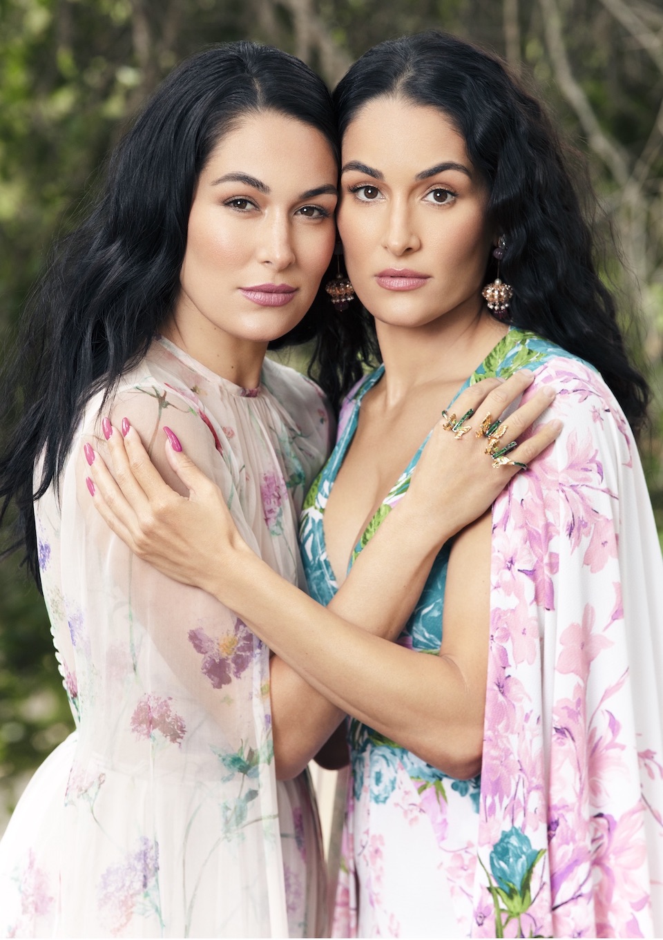 WWE Divas Brie Bella and Nikki Bella attend a photocall to promote