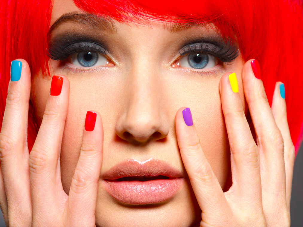 beautiful-girl-with-bright-multicolor-nails