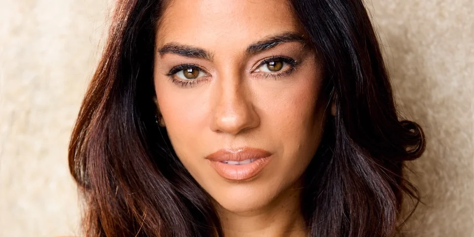 Portrait of Sharon Carpenter, journalist, actress, television host, and producer, featured in an exclusive Ebby Magazine interview.